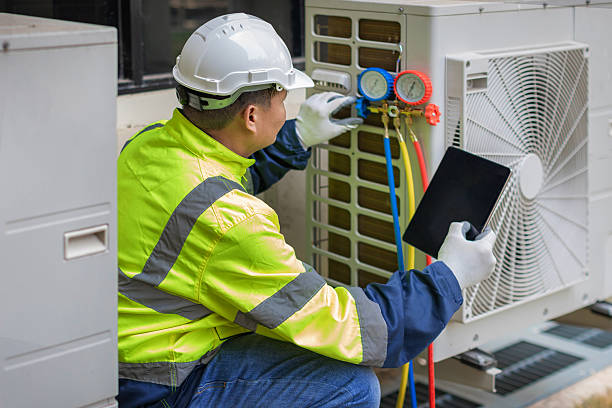 Professional Heat Pump Repair technician working in Riverside, IA